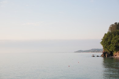 Picturesque view of sea and city under sky outdoors