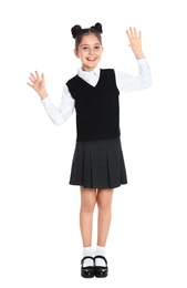 Happy girl in school uniform on white background