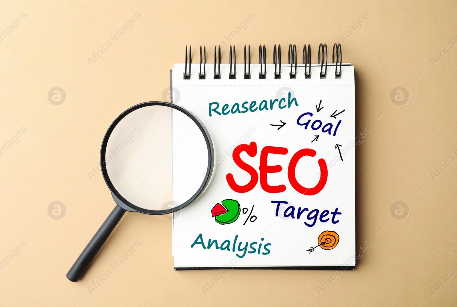 Image of Search engine optimization. Notebook with abbreviation SEO and magnifying glass on beige background, top view