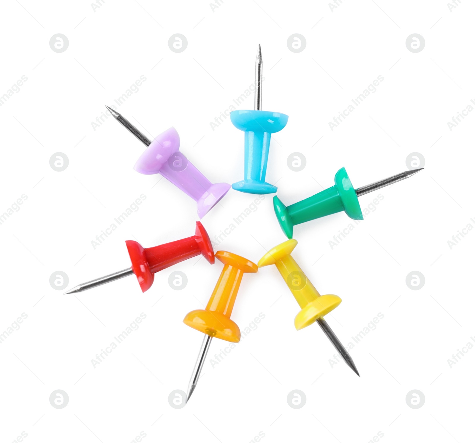 Photo of Composition with drawing pins on white background, top view. Rainbow palette