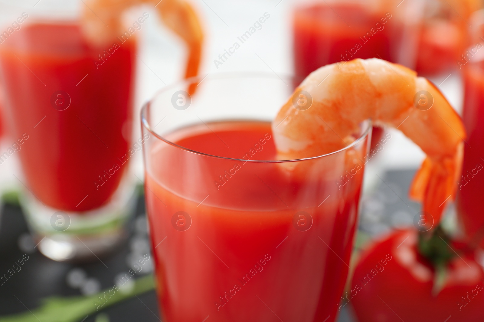 Photo of Delicious shrimp cocktail with tomato sauce, closeup