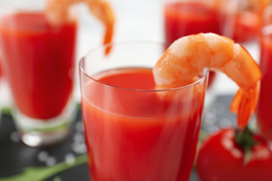 Photo of Delicious shrimp cocktail with tomato sauce, closeup