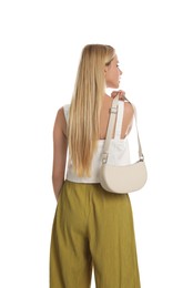 Photo of Beautiful stylish woman with trendy baguette bag on white background, back view