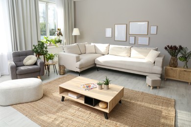 Beautiful living room interior with comfortable sofa