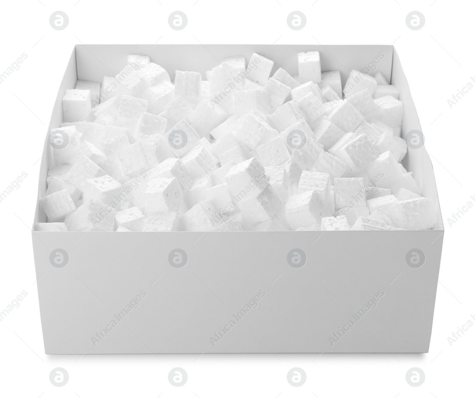 Photo of Cardboard box with styrofoam cubes isolated on white