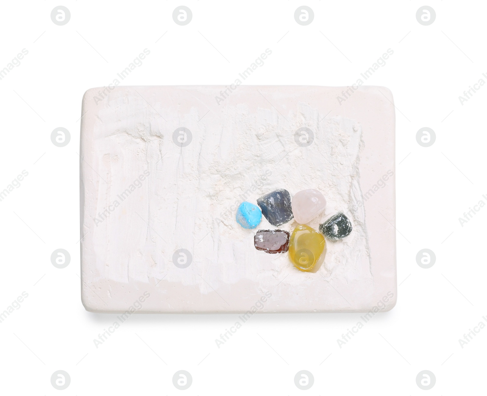 Photo of Excavation kit on white background, top view. Educational toy for motor skills