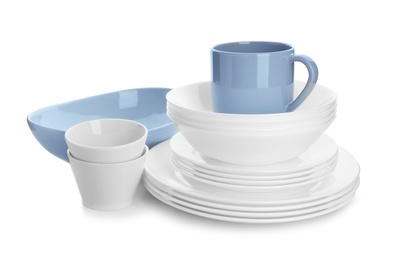 Photo of Different clean tableware on white background