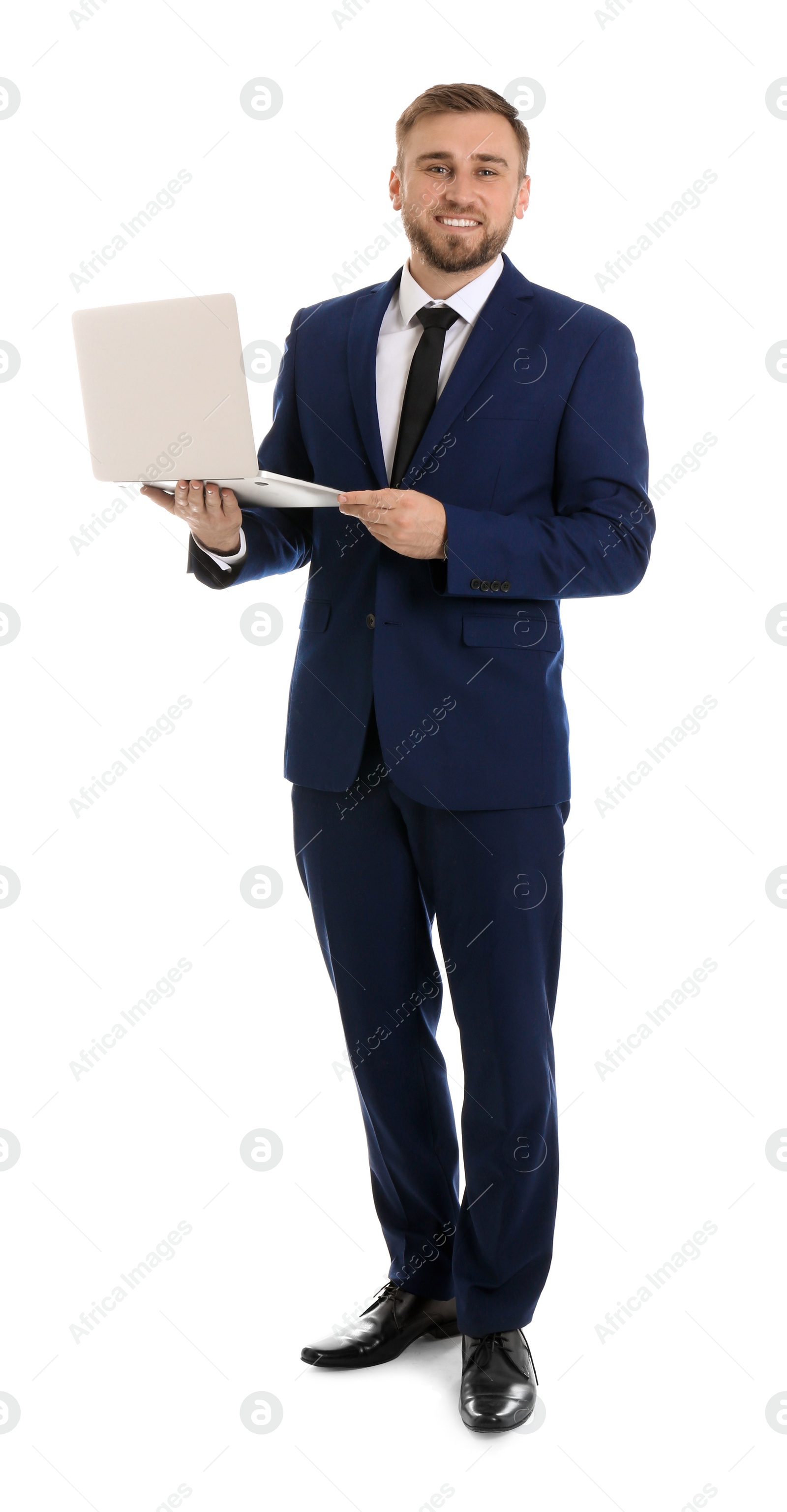 Photo of Happy young businessman holding laptop on white background