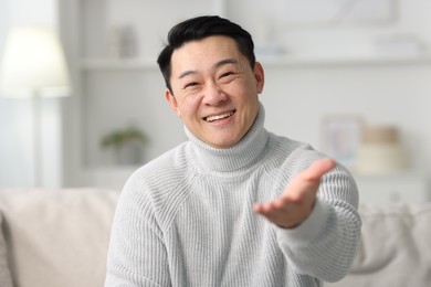 Portrait of smiling man on blurred background