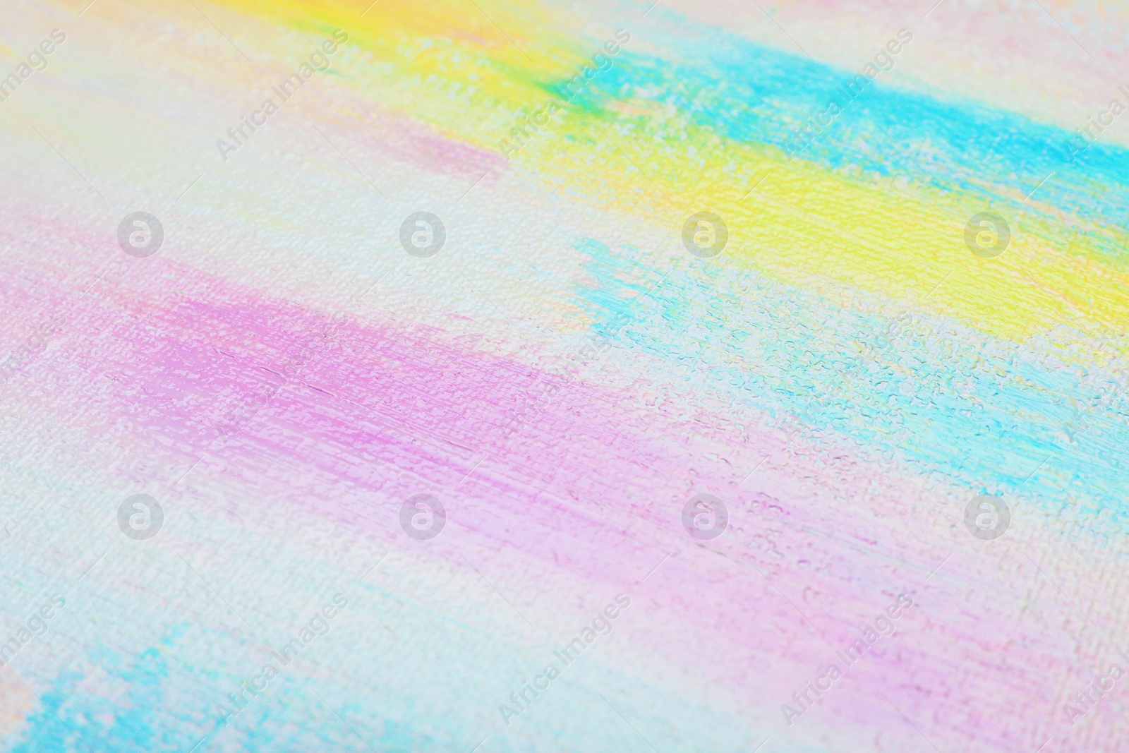 Photo of Strokes of different pastel acrylic paints on white canvas, closeup