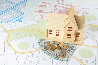 Money and house model on cadastral maps