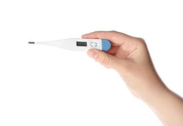 Photo of Woman holding digital thermometer on white background, closeup