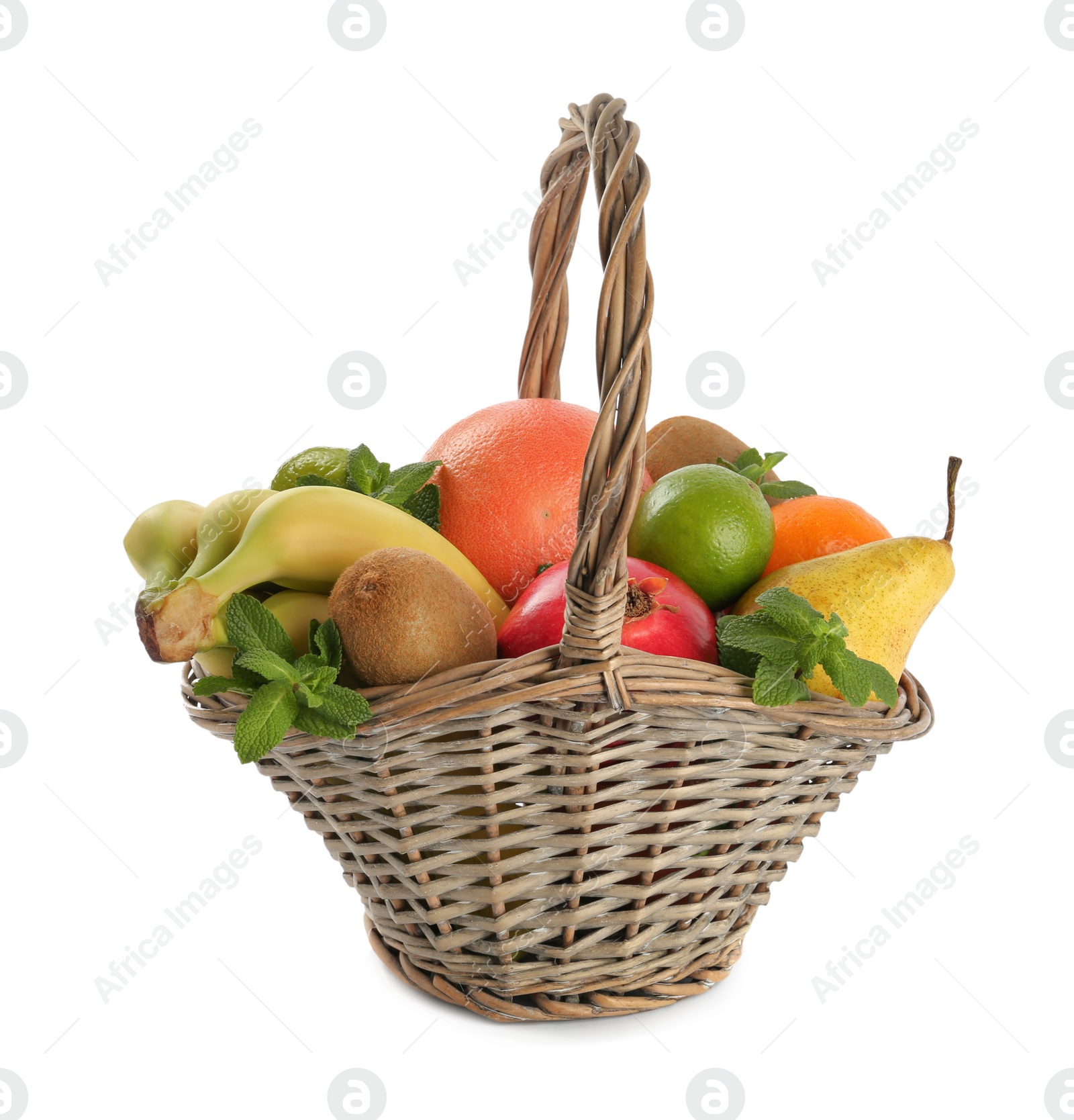Photo of Wicker basket with different ripe fruits on white background