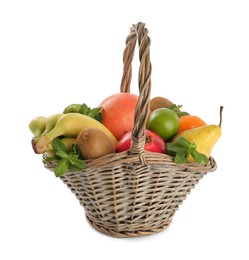 Wicker basket with different ripe fruits on white background