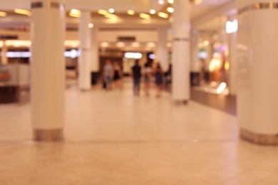Photo of Blurred view of big modern shopping mall