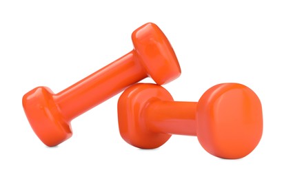 Photo of Orange dumbbells isolated on white. Sports equipment
