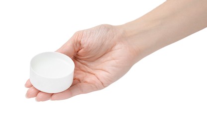 Photo of Woman holding jar of petroleum jelly on white background, closeup