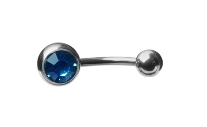 Photo of Piercing jewelry. Belly button ring isolated on white
