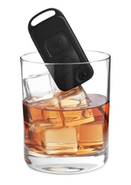 Photo of Glass of alcohol and car key on white background. Drunk driving concept