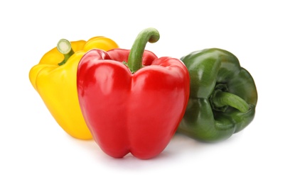 Photo of Raw ripe paprika peppers on white background
