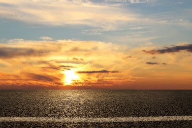 Image of View of empty asphalt road at sunset