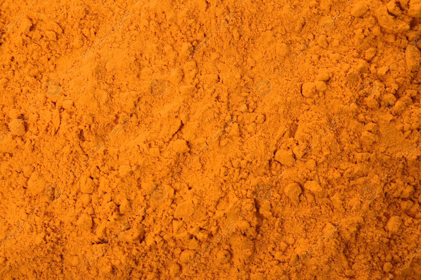 Photo of Aromatic saffron powder as background, top view