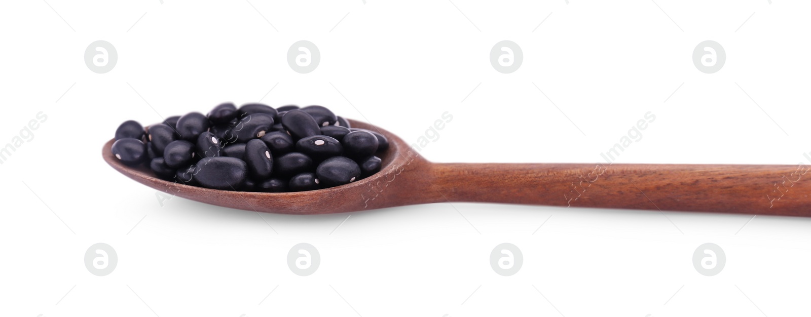 Photo of Wooden spoon with raw kidney beans isolated on white