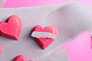 Composition with heart shaped berry ice cubes on color background, flat lay