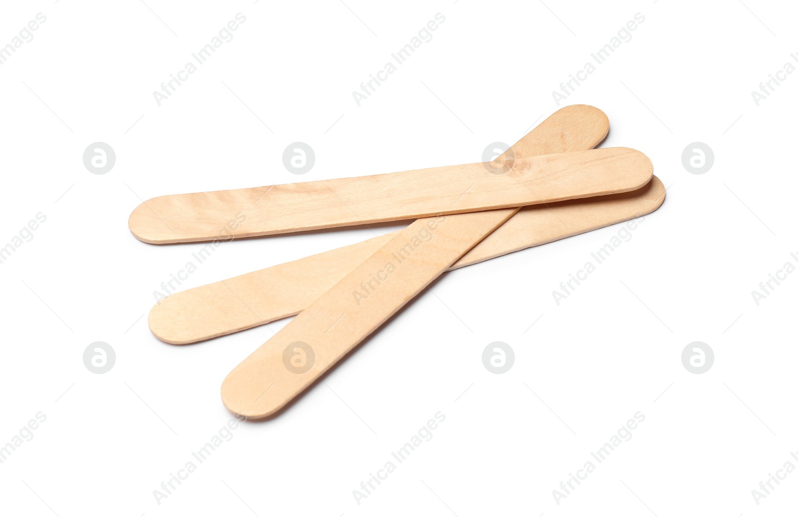 Photo of Empty wooden ice cream sticks on white background