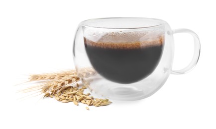 Cup of barley coffee, grains and spikes isolated on white