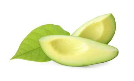 Photo of Slices of ripe avocado isolated on white