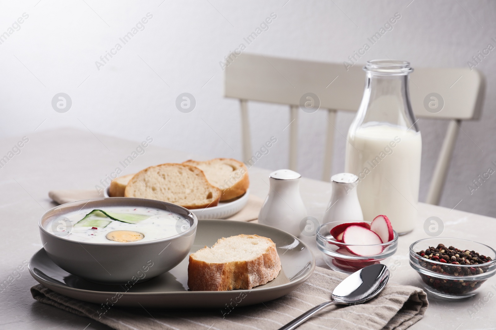 Photo of Delicious cold summer soup on light table