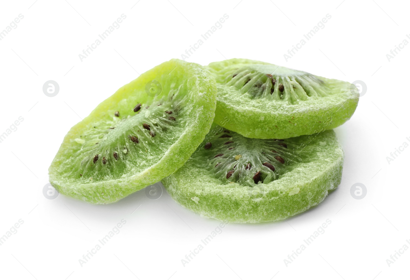 Photo of Slices of kiwi on white background. Dried fruit as healthy food