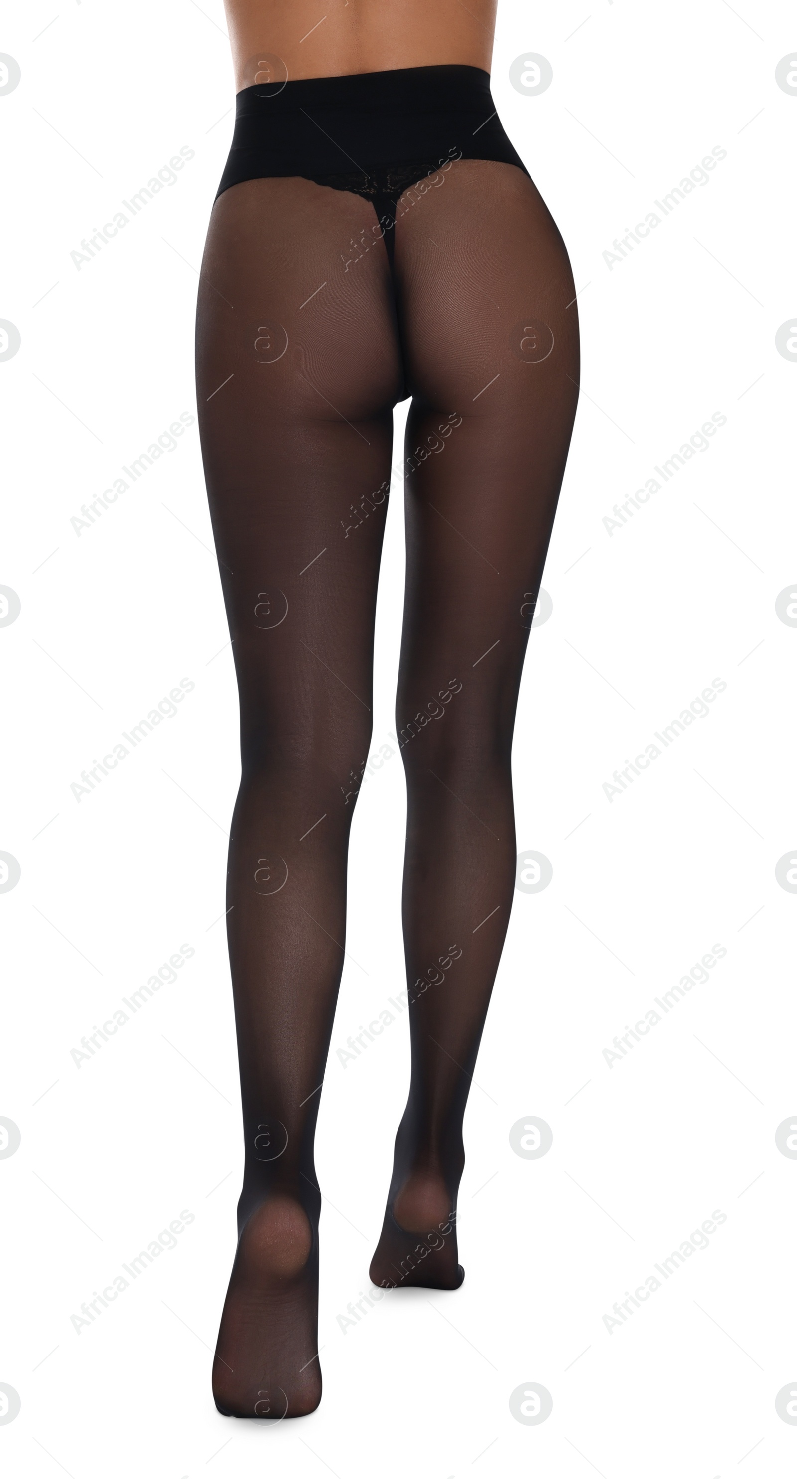 Photo of Woman with beautiful long legs wearing black tights on white background, closeup