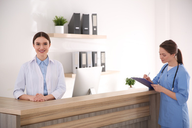 View of modern clinic with working doctors