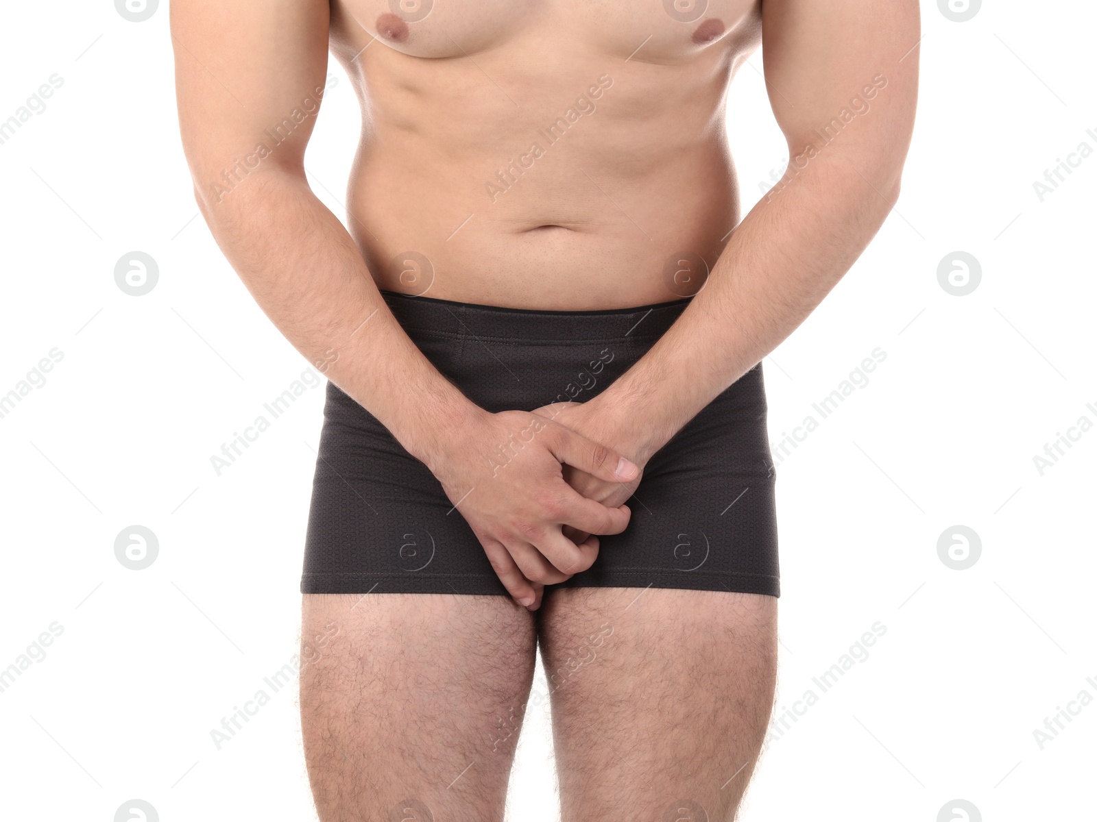 Photo of Young man with urological problems suffering from pain on white background