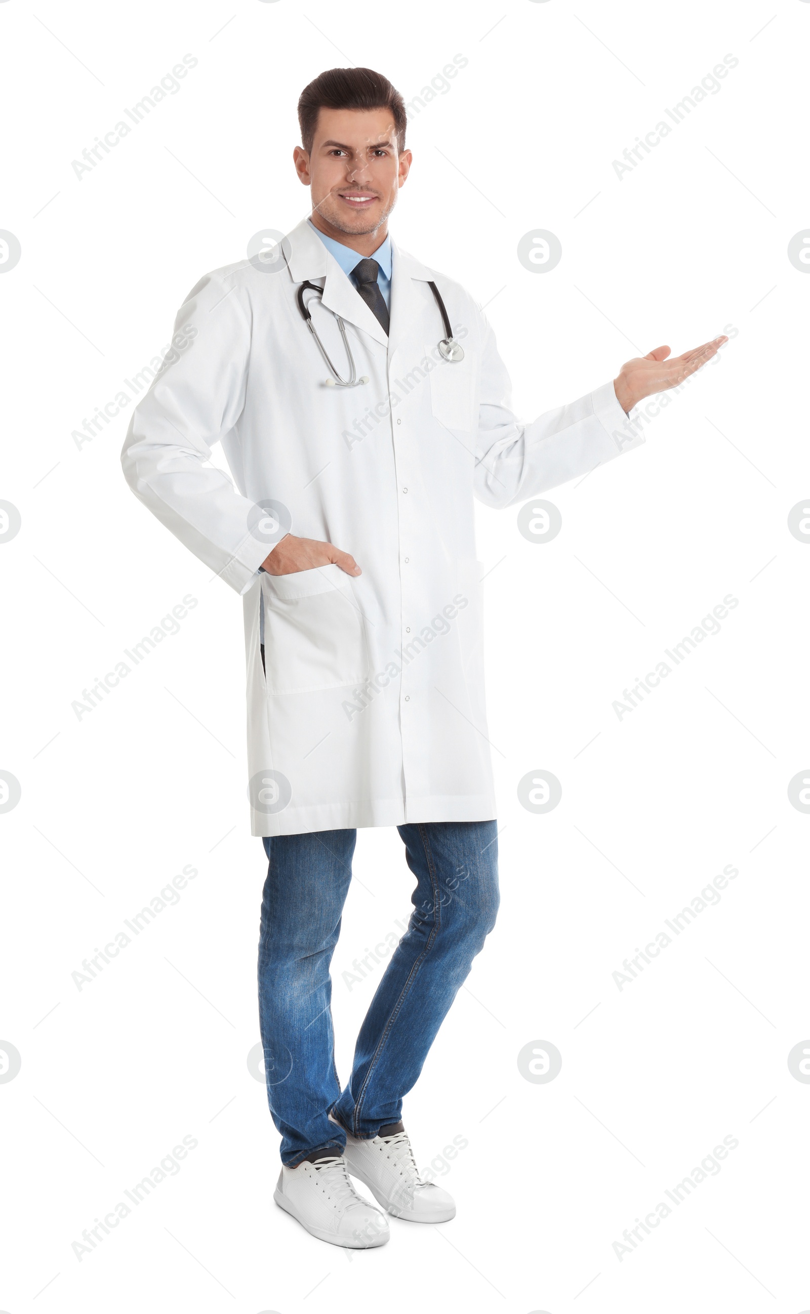Photo of Full length portrait of doctor on white background