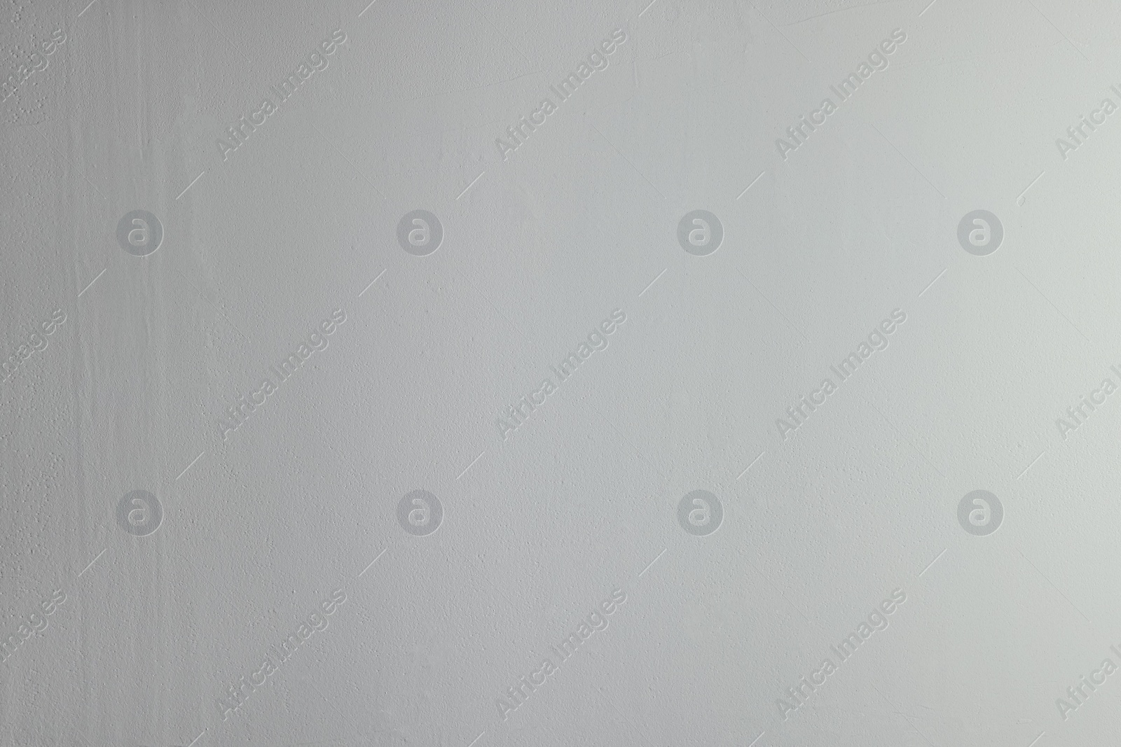 Photo of Wall covered with plaster as background, closeup