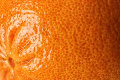 Photo of Ripe orange as background, closeup. Citrus fruit