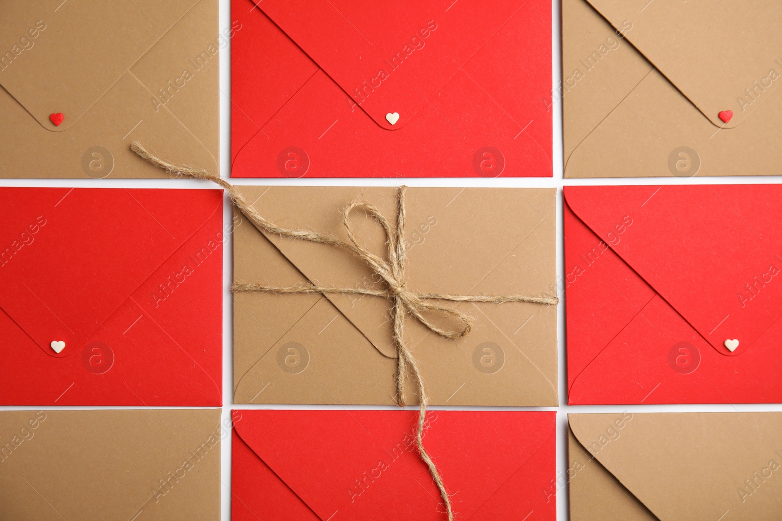 Photo of Envelopes on white background, flat lay. Love letters