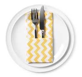 Photo of Plates with cutlery and napkin on white background, top view. Table setting