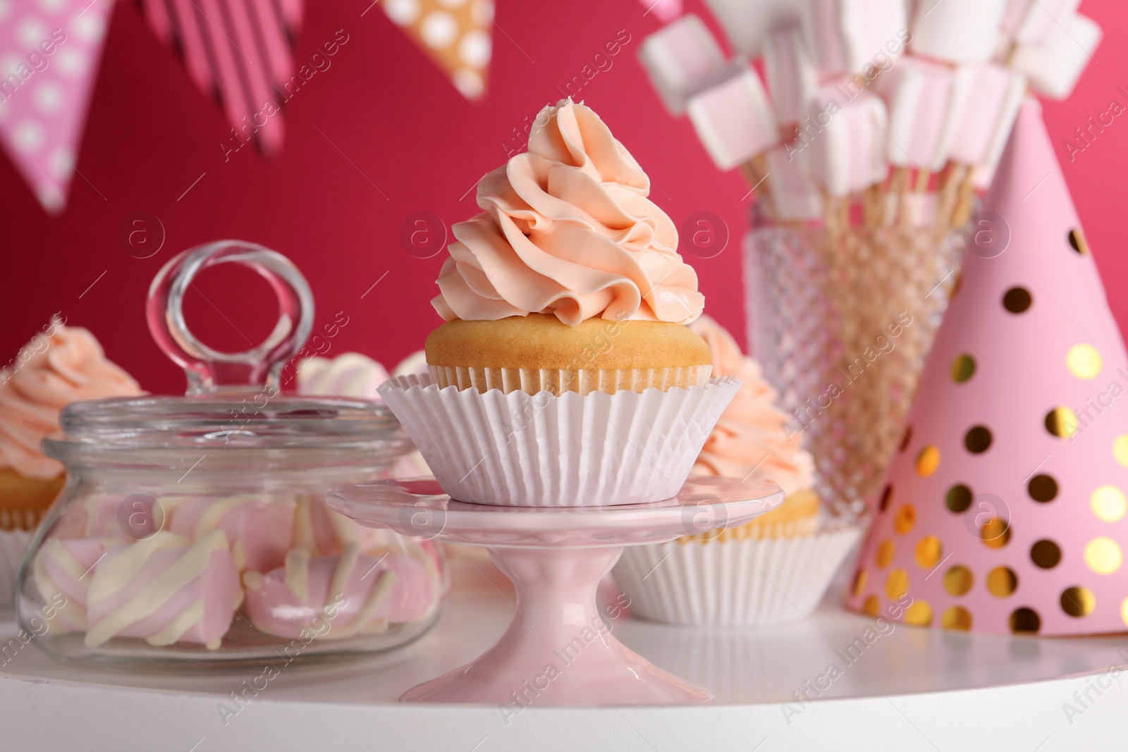 Photo of Tasty cupcake and other sweets on table. Candy bar, closeup view