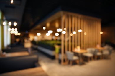 Photo of Blurred view of stylish modern cafe interior