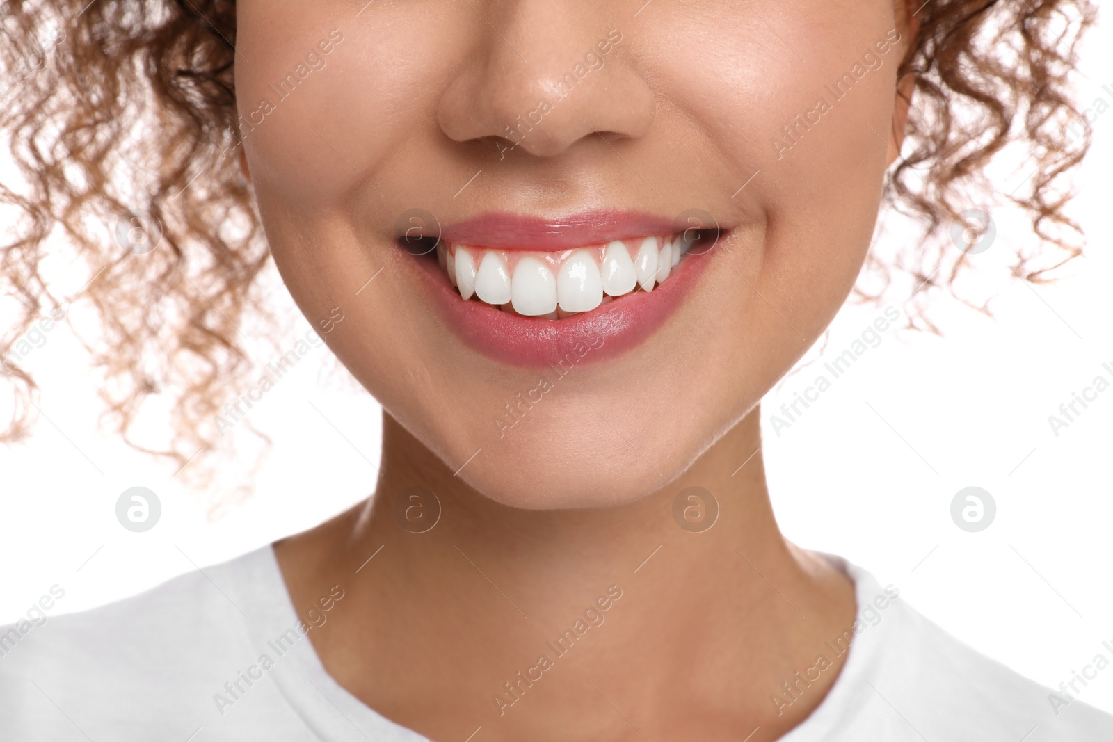 Photo of Young woman with healthy teeth on white background, closeup