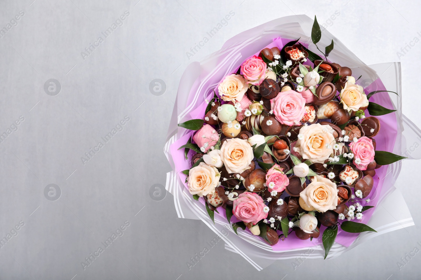 Photo of Beautiful food bouquet on light grey background, top view. Space for text