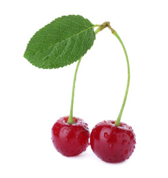 Photo of Sweet red juicy cherries with water drops isolated on white