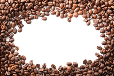 Photo of Frame of roasted coffee beans on white background, top view