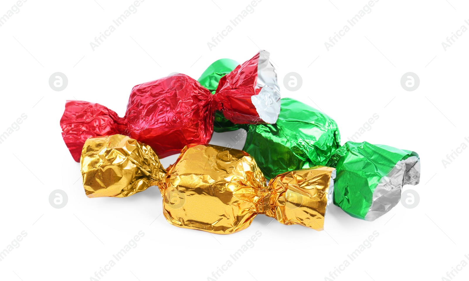 Photo of Tasty candies in colorful wrappers isolated on white