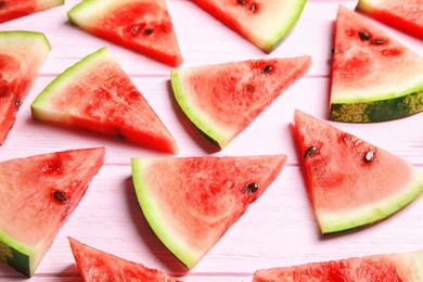 Photo of Composition with watermelon slices on wooden background