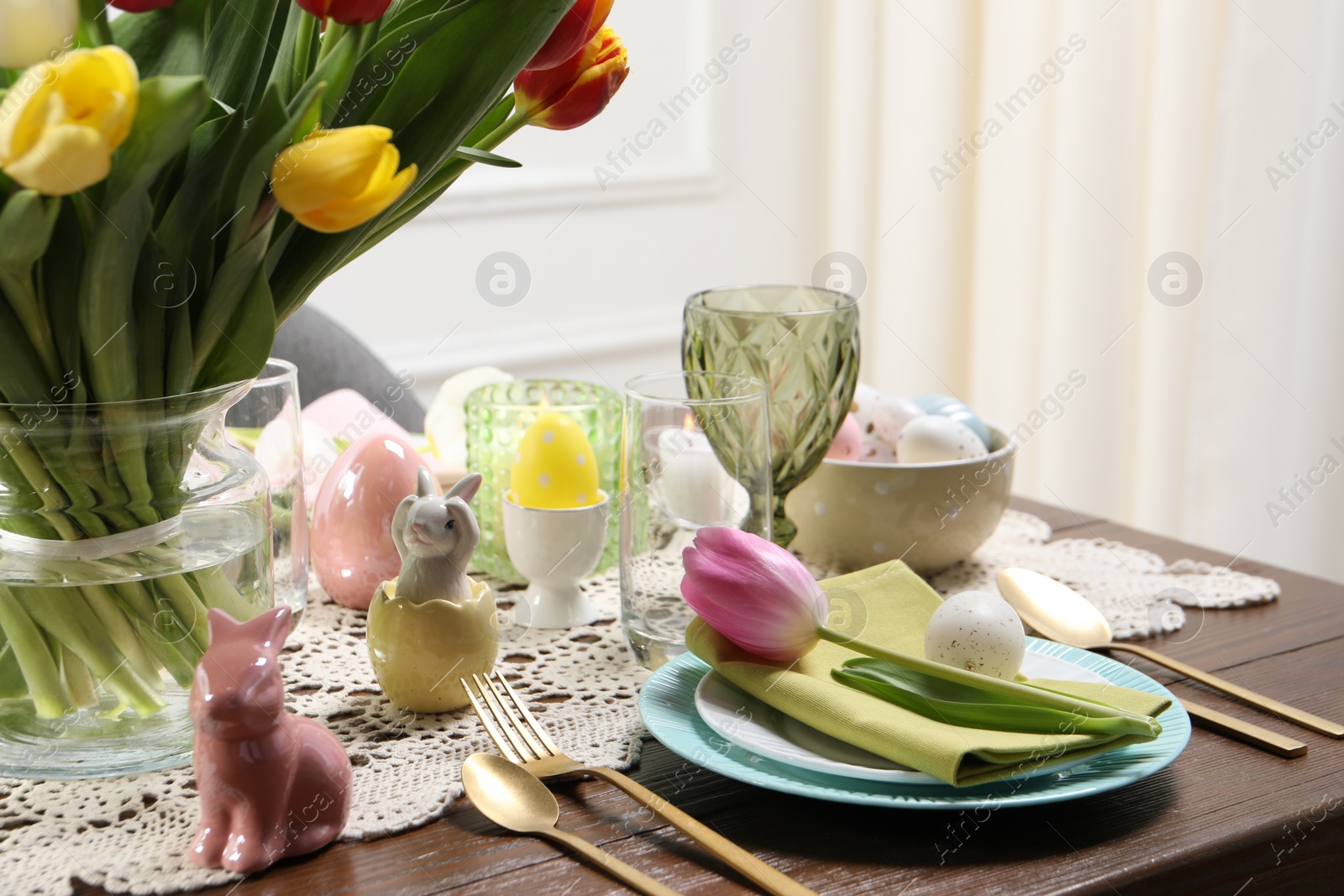 Photo of Festive table setting with beautiful flowers. Easter celebration